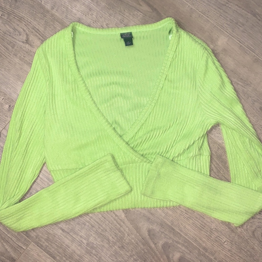 I’m selling a soft green long sleeve with indented stripes a a low v neck.